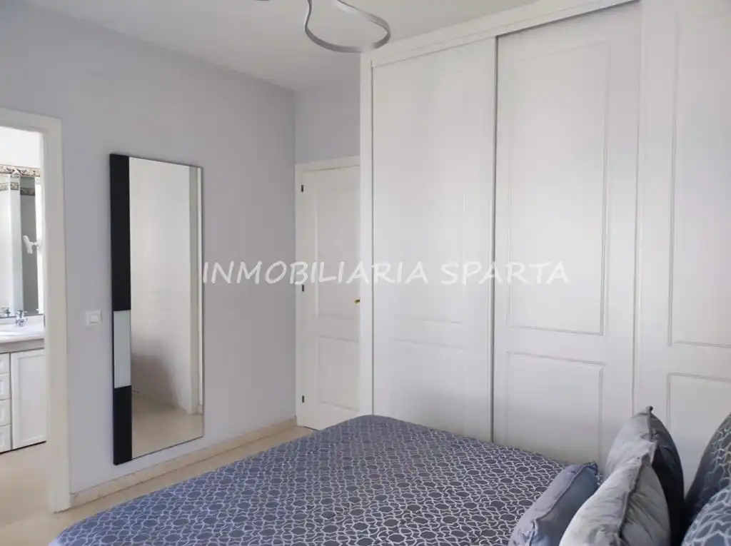 Habitación de Casa adosada en venta en Coria del Río con Aire acondicionado, Terraza y Trastero