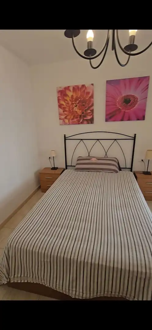Dormitori de Apartament de lloguer en Adeje amb Piscina comunitària