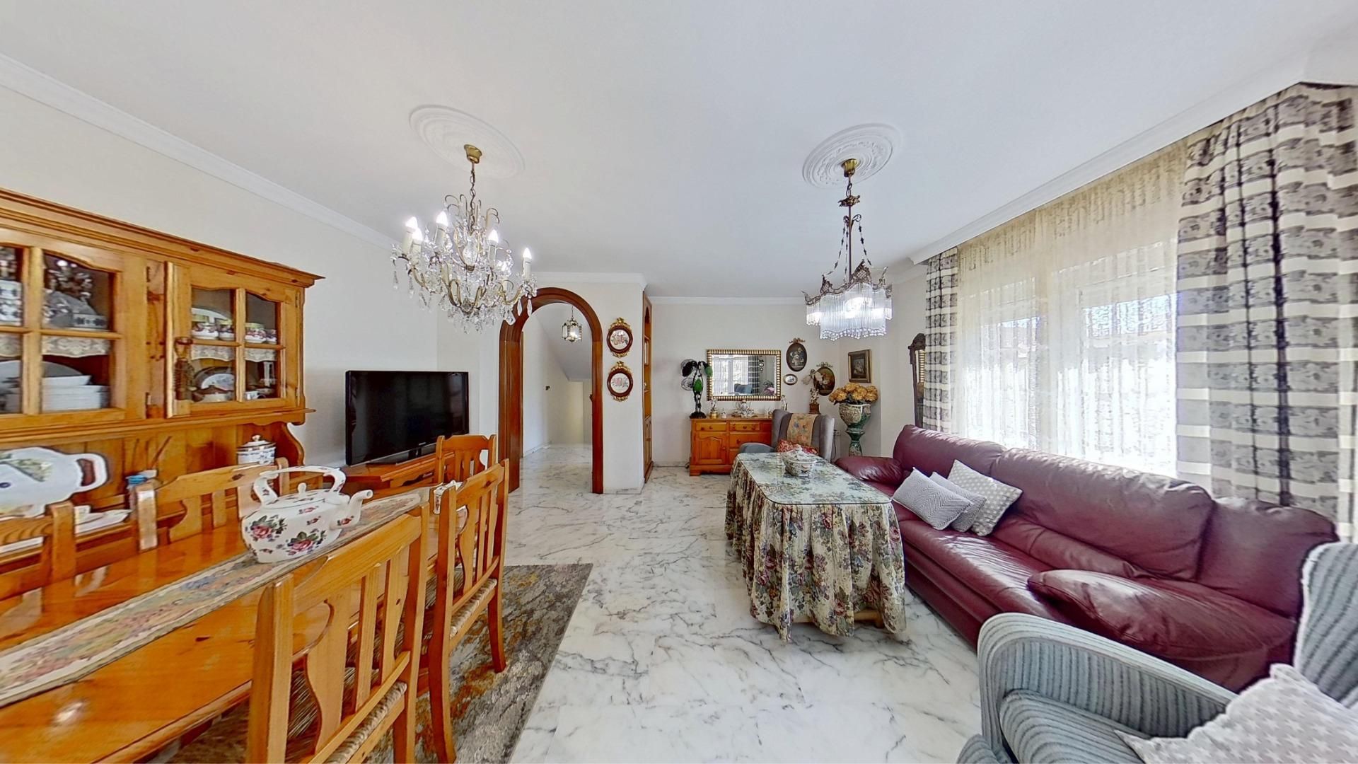 Sala d'estar de Casa adosada en venda en Motril amb Aire condicionat, Parquet i Terrassa