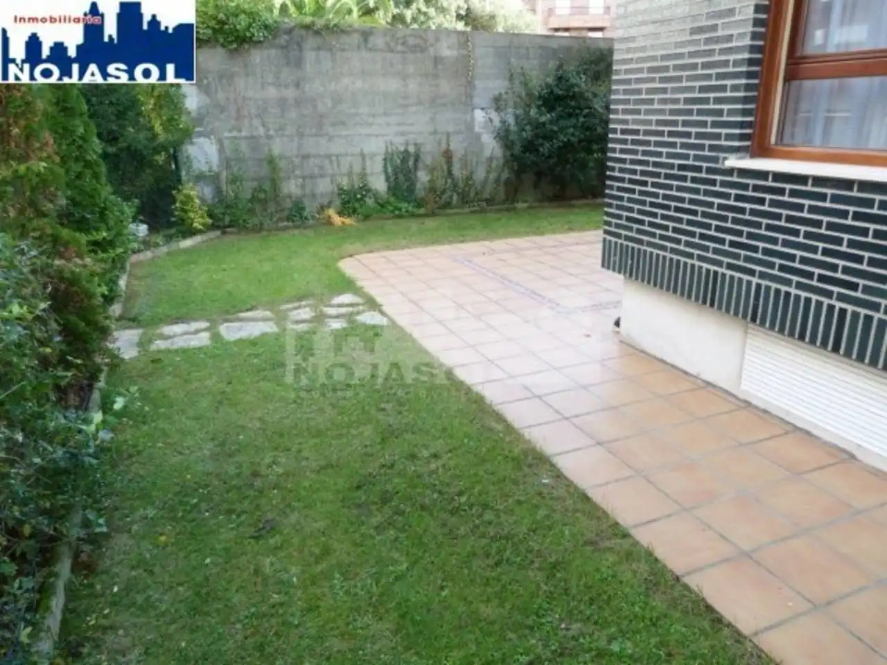 Jardí de Apartament de lloguer en Noja amb Calefacció, Jardí privat i Terrassa