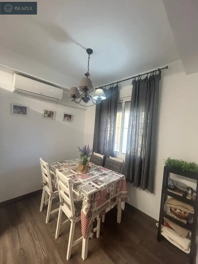 Menjador de Apartament en venda en Isla Cristina amb Aire condicionat, Jardí privat i Terrassa