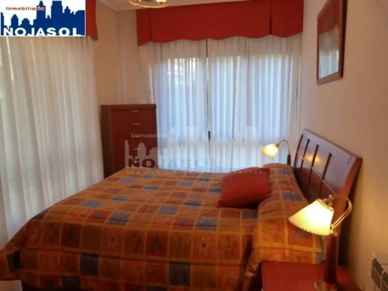 Dormitori de Apartament de lloguer en Noja amb Calefacció, Jardí privat i Terrassa