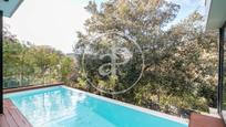 Swimming pool of House or chalet for sale in  Barcelona Capital  with Air Conditioner, Heating and Private garden