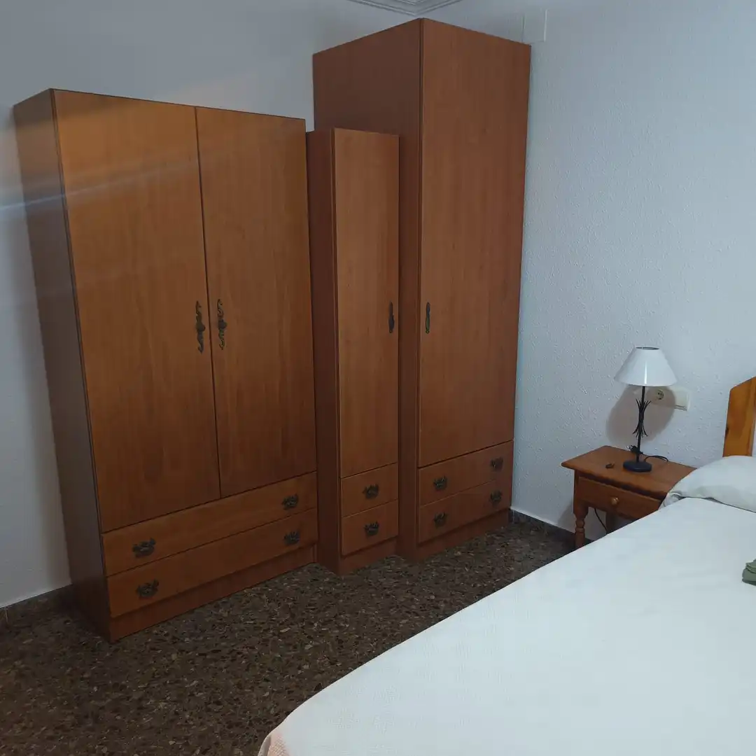 Habitación de Apartamento de alquiler en La Pobla de Farnals con Aire acondicionado, Calefacción y Jardín privado