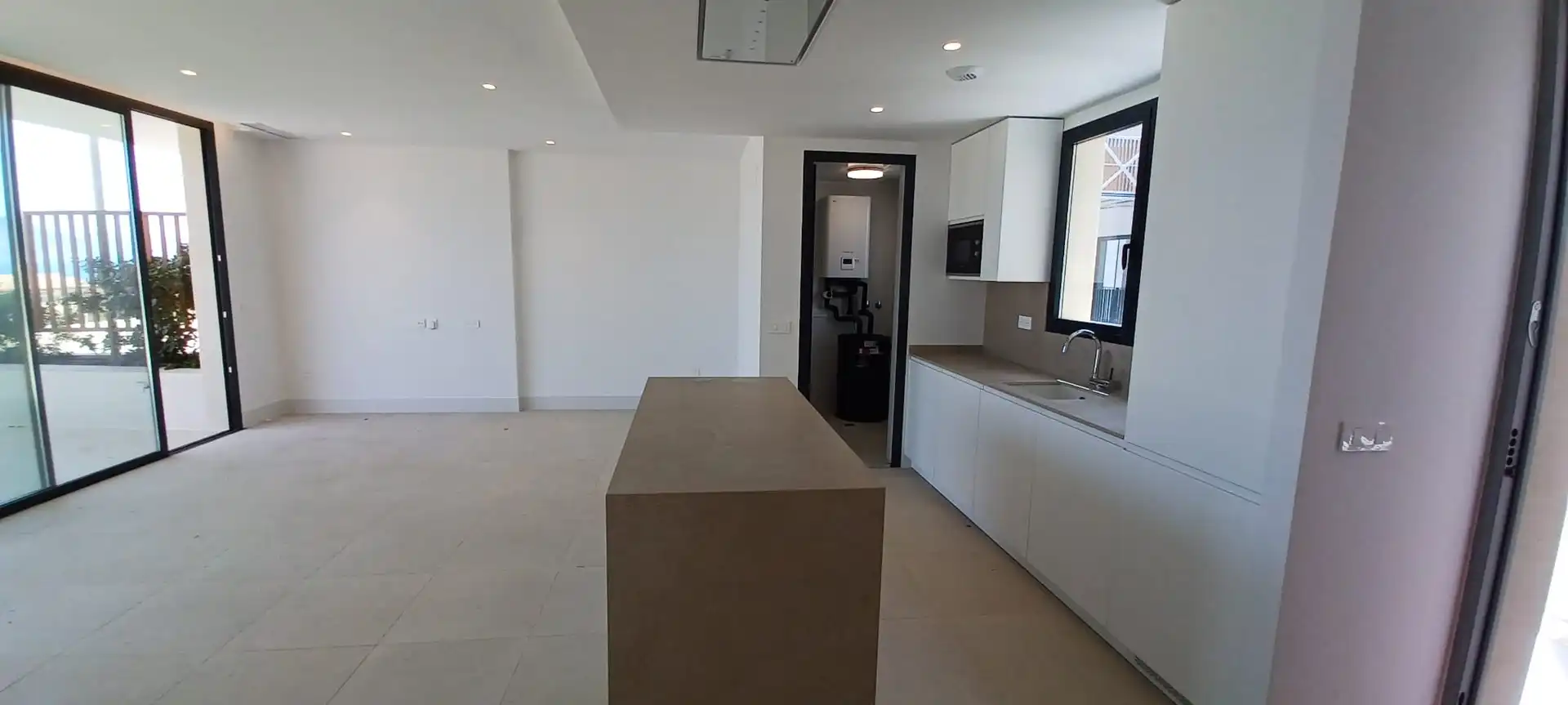 Cocina de Apartamento en venta en L'Alfàs del Pi con Aire acondicionado, Calefacción y Jardín privado