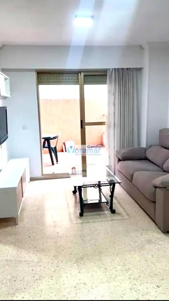 Sala d'estar de Apartament en venda en Gandia amb Aire condicionat, Jardí privat i Terrassa