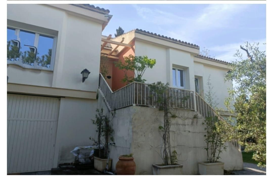 Vista exterior de Casa o xalet en venda en Mairena del Aljarafe amb Aire condicionat, Calefacció i Jardí privat
