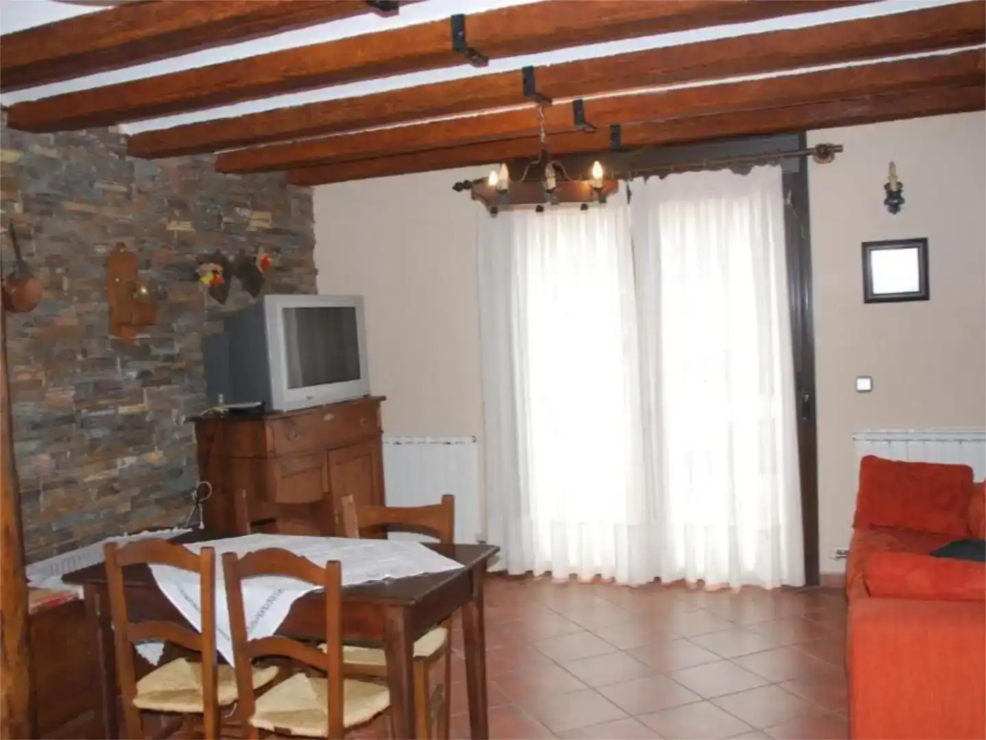 Sala d'estar de Casa adosada en venda en San Juan de Plan amb Balcó