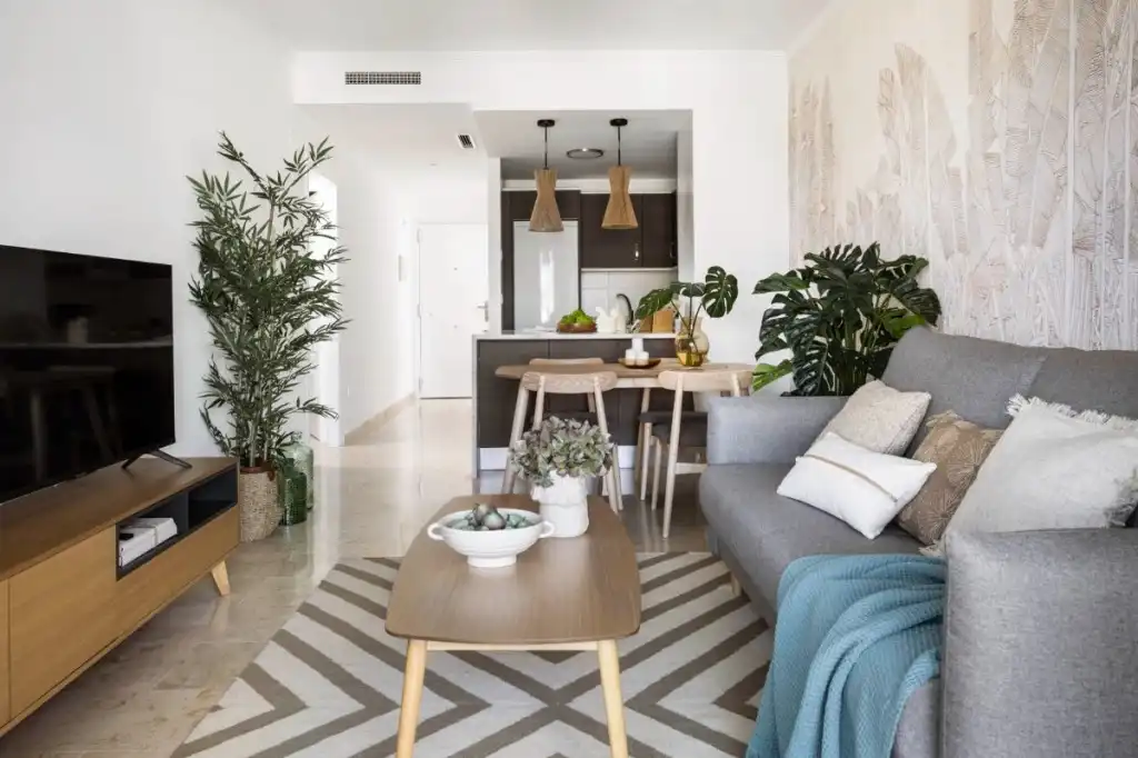 Sala d'estar de Apartament en venda en Manilva amb Aire condicionat, Jardí privat i Terrassa