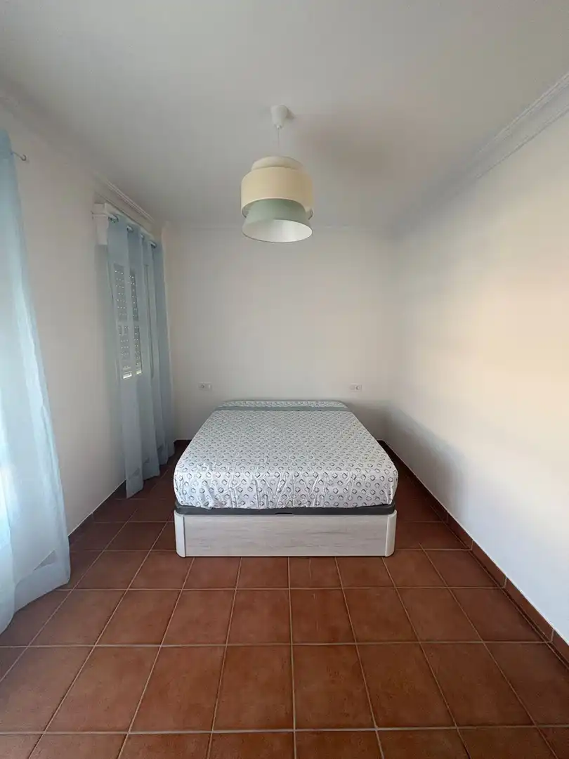 Dormitori de Casa o xalet de lloguer en Aljaraque amb Terrassa i Moblat