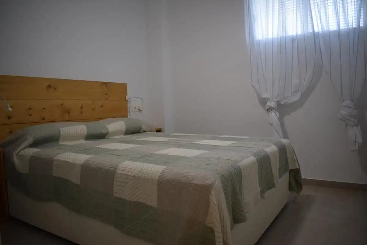 Habitación de Apartamento de alquiler en Almuñécar con Aire acondicionado, Terraza y Amueblado