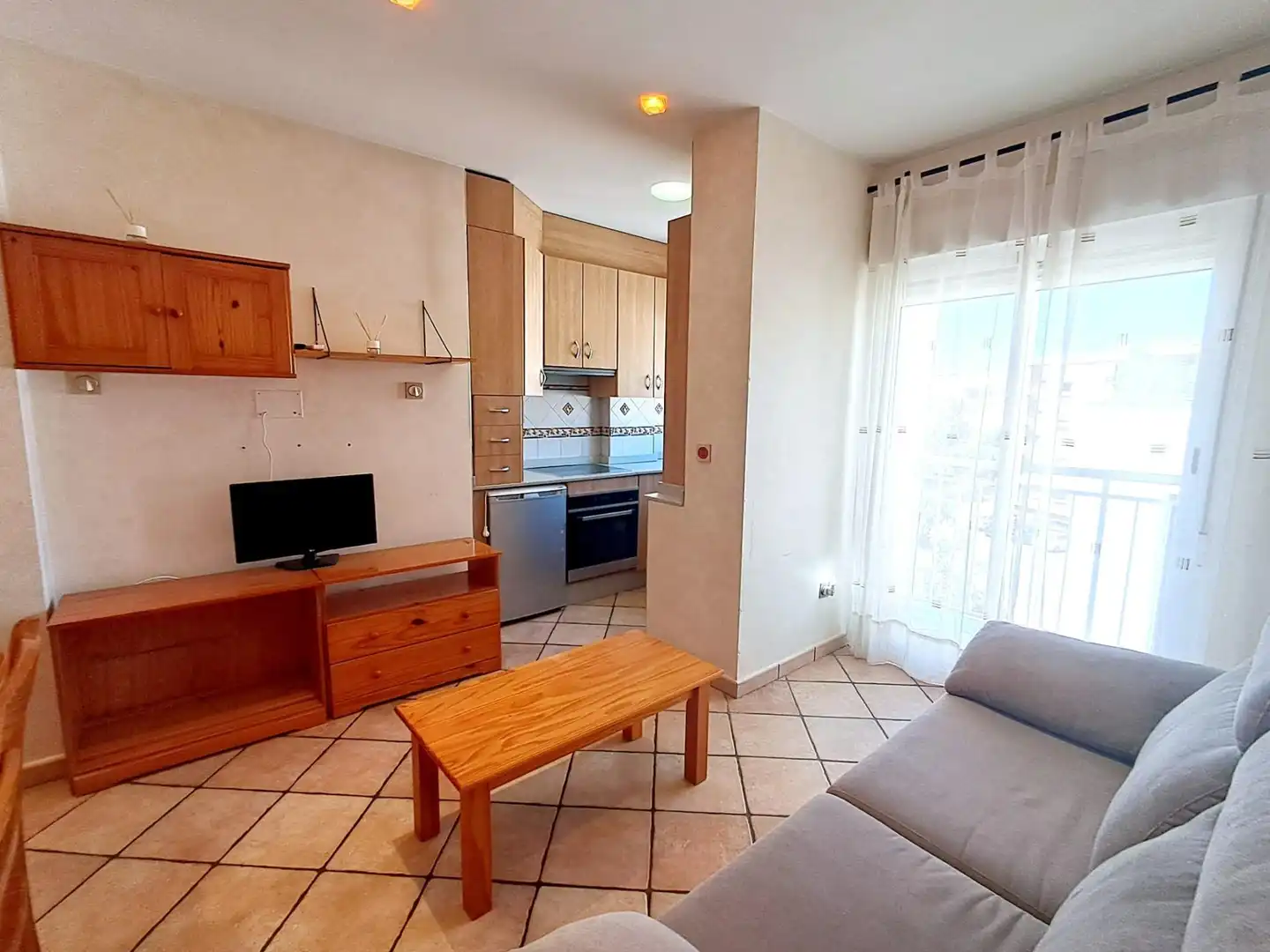 Sala d'estar de Apartament en venda en Águilas amb Aire condicionat, Calefacció i Jardí privat