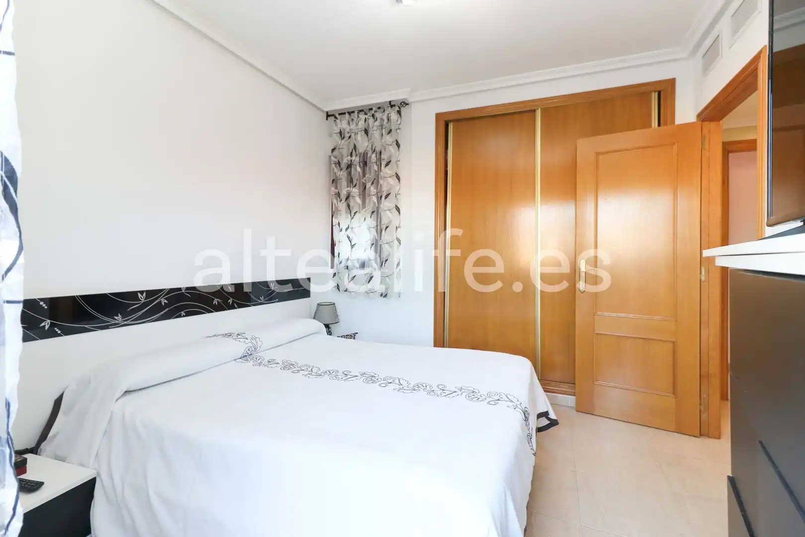 Habitación de Casa adosada en venta en La Nucia con Calefacción, Terraza y Piscina comunitaria