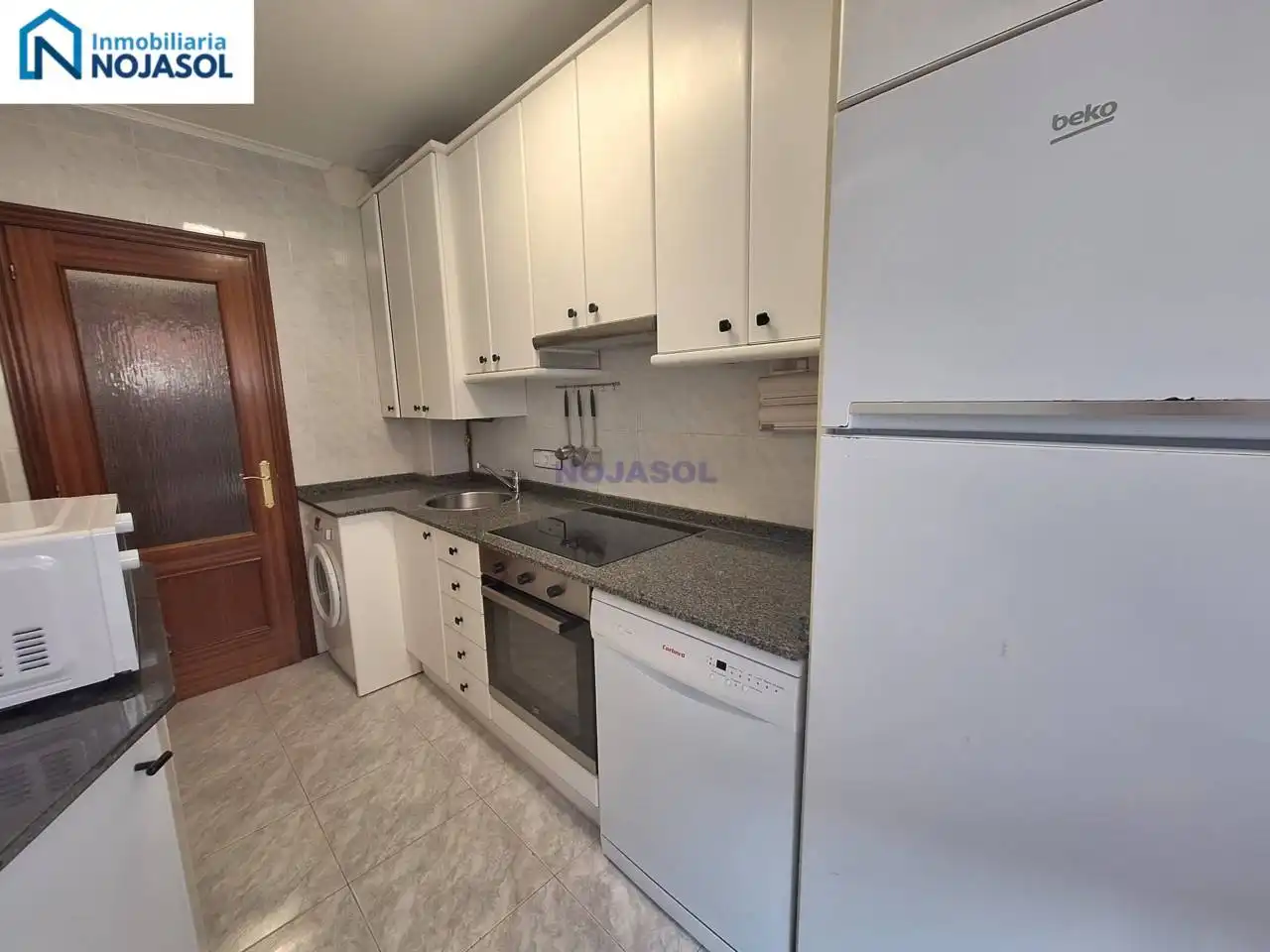Cuina de Apartament de lloguer en Noja amb Calefacció, Jardí privat i Terrassa