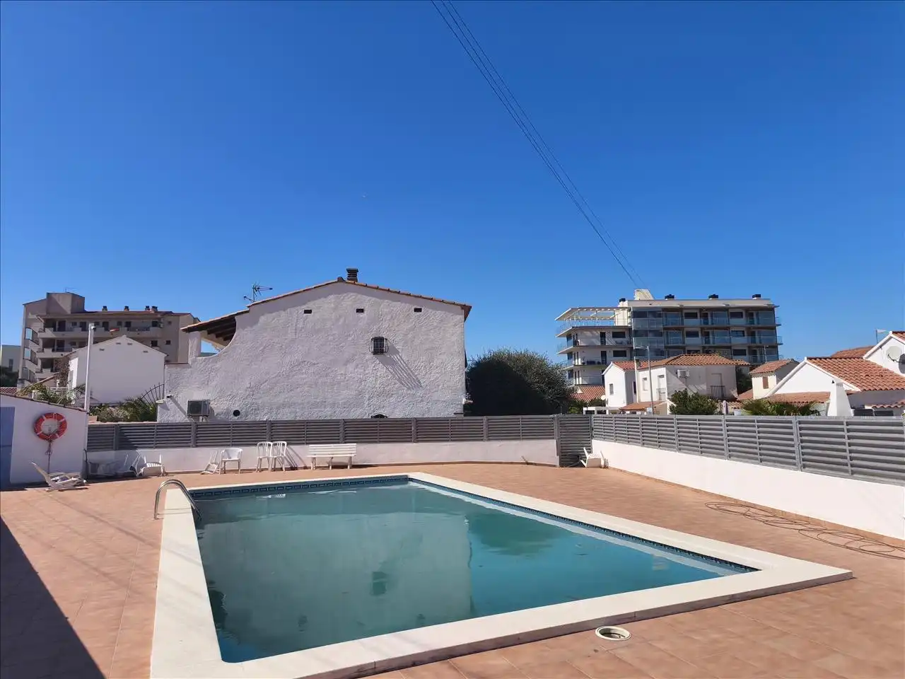 Casa aparellada amb piscina en venda a De La Illeta