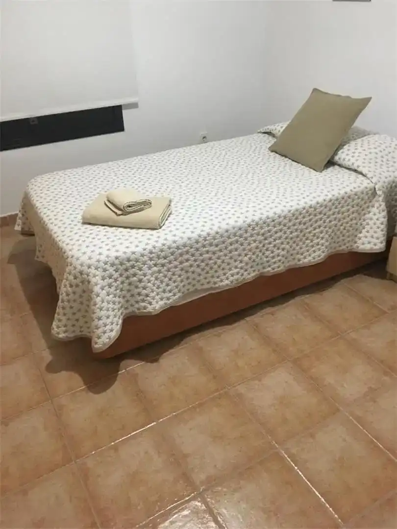 Dormitori de Casa adosada en venda en Arrecife amb Aire condicionat, Jardí privat i Traster