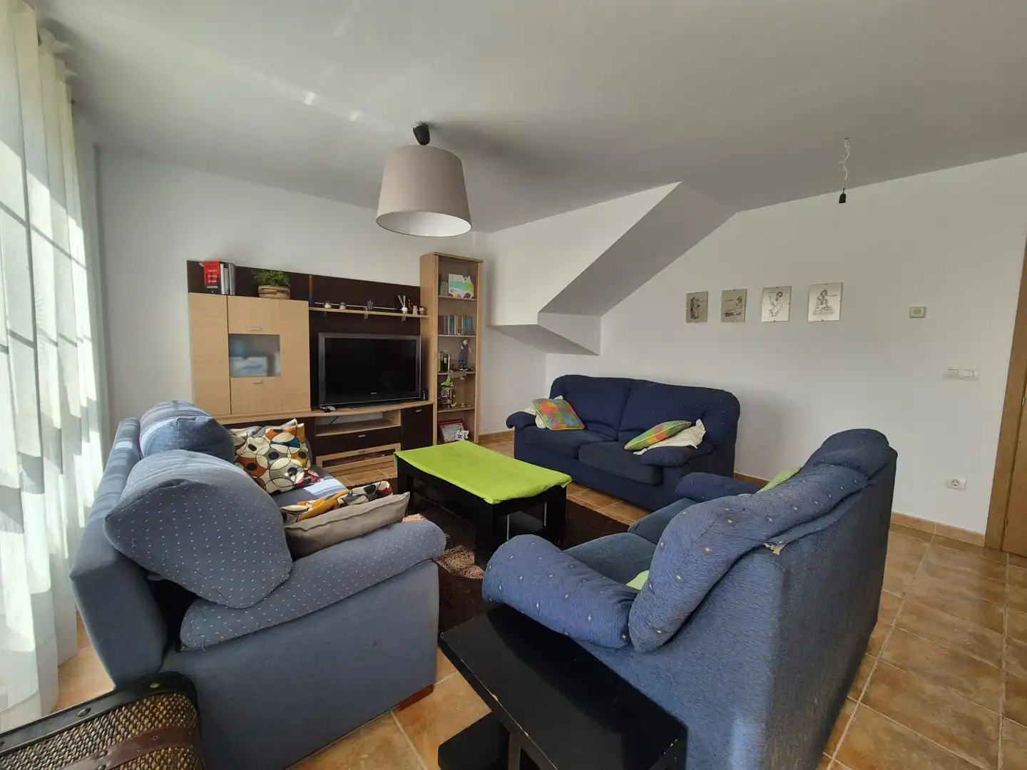 Sala d'estar de Casa adosada en venda en Burgos