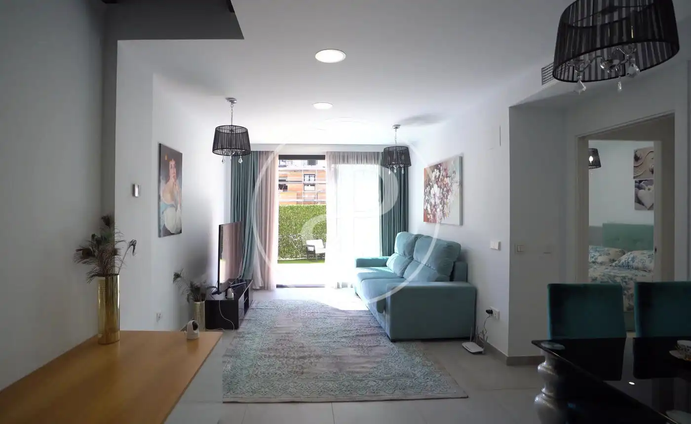 Wohnzimmer von Einfamilien-Reihenhaus zum Verkauf in Villajoyosa / La Vila Joiosa mit Klimaanlage, Heizung und Privatgarten
