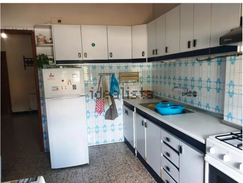 Cuina de Casa adosada en venda en Ourense Capital  amb Calefacció, Jardí privat i Parquet