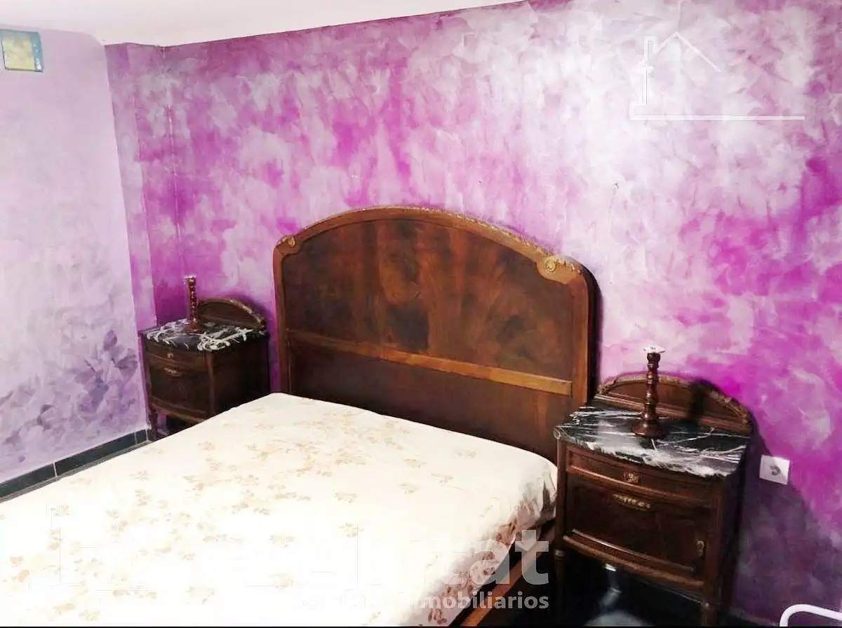 Dormitori de Casa adosada en venda en Sueca amb Moblat