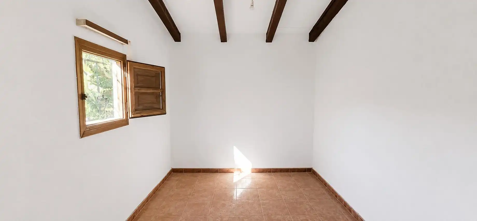 Sala d'estar de Finca rústica en venda en L'Aldea amb Traster