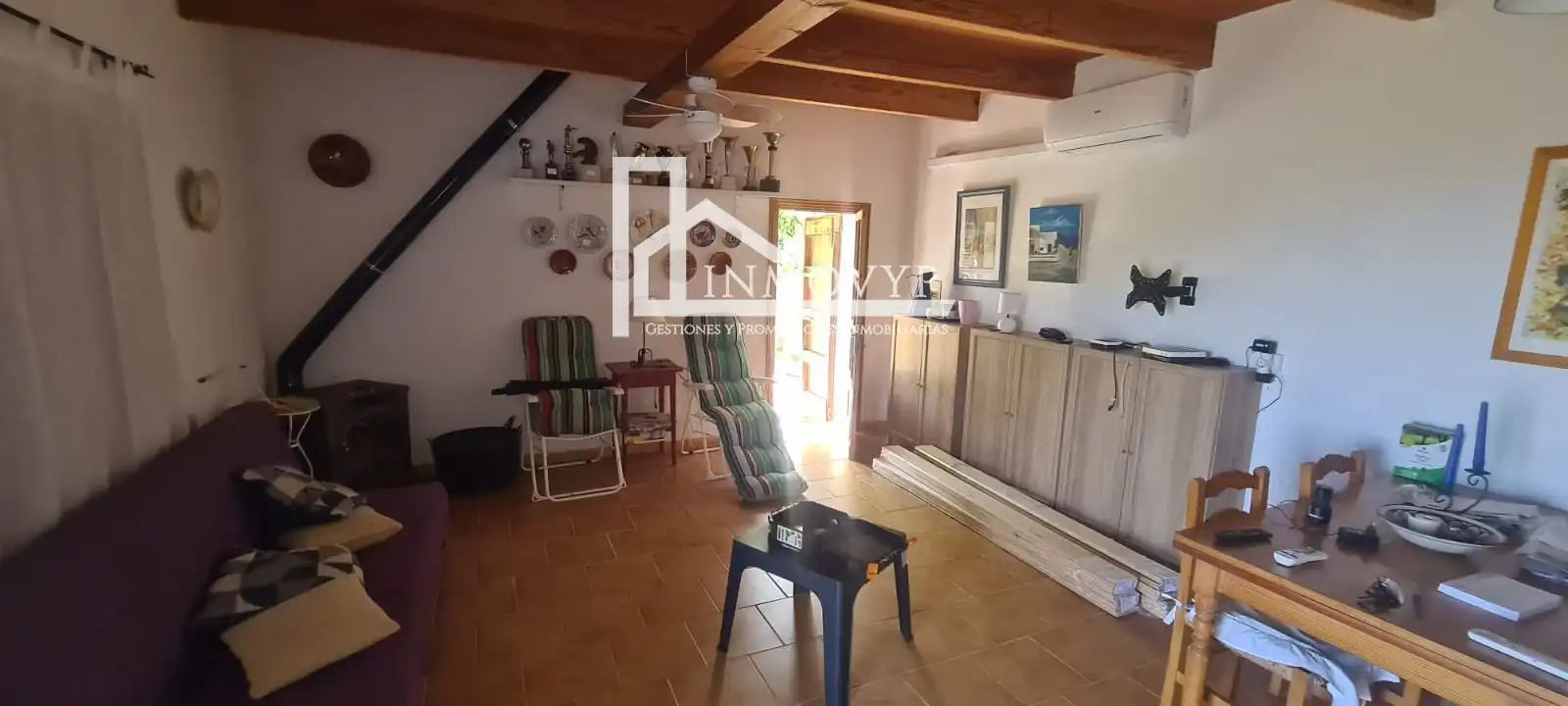 Sala de estar de Finca rústica en venta en Escorca con Aire acondicionado y Amueblado
