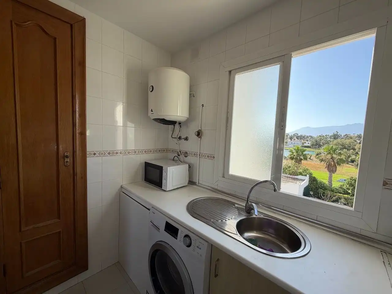Kitchen of Apartments for sale in Roquetas de Mar  with Air Conditioner, Heating and Terrace