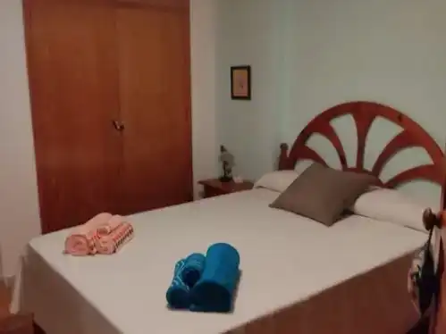 Dormitori de Apartament de lloguer en Almuñécar amb Parquet, Piscina i Moblat