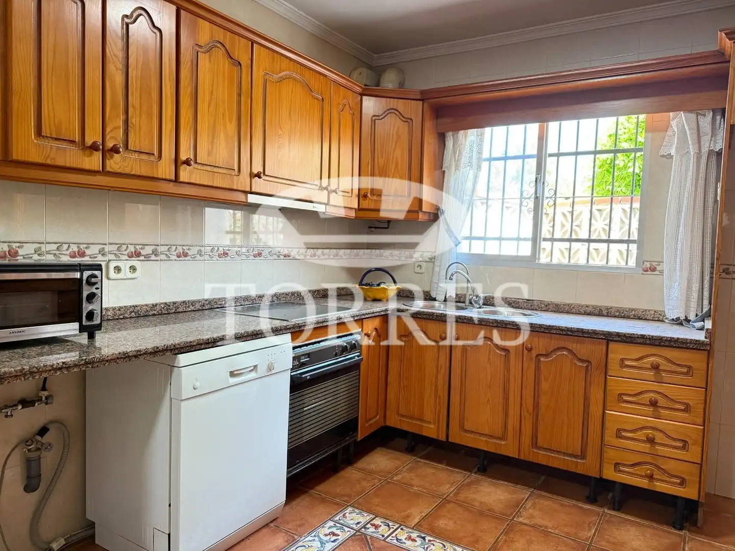 Cocina de Casa adosada en venta en Málaga con Terraza, Balcón y Piscina comunitaria