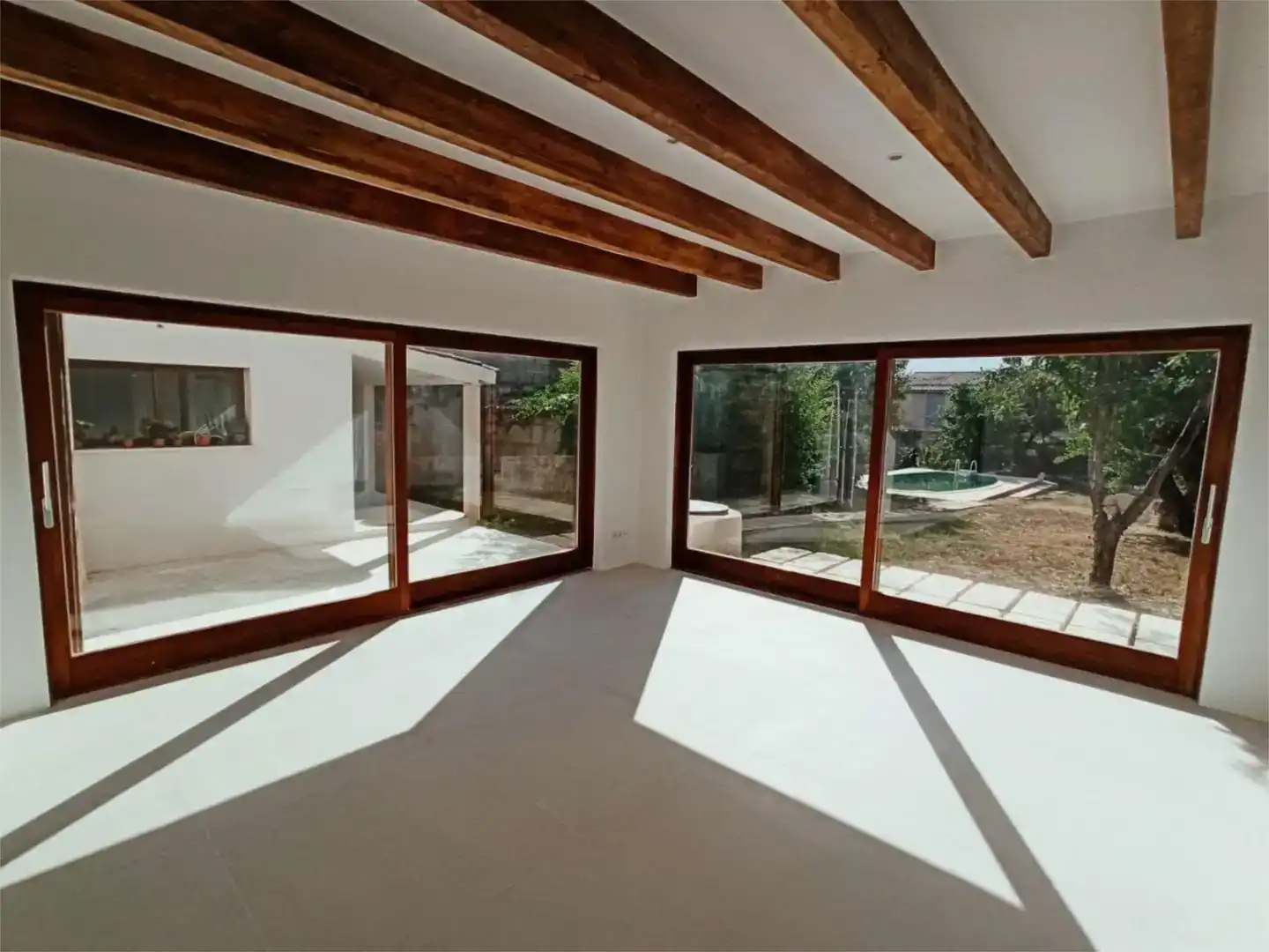 Sala d'estar de Casa adosada en venda en Campanet amb Aire condicionat, Piscina i Balcó