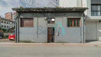 Vista exterior de Casa adosada en venda en Langreo amb Jardí privat