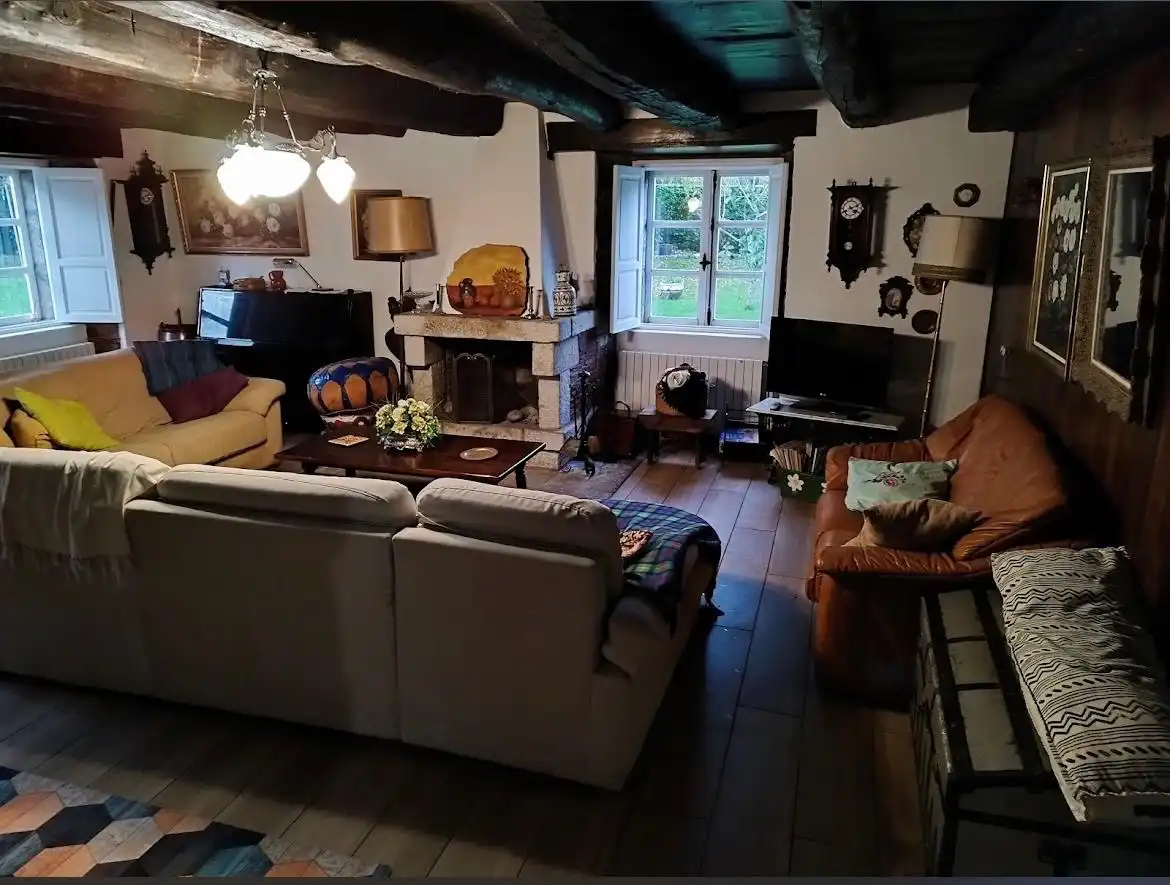 Sala de estar de Finca rústica en venta en Outeiro de Rei con Piscina y Amueblado