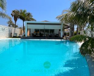 Swimming pool of House or chalet for sale in La Manga del Mar Menor  with Air Conditioner, Heating and Private garden