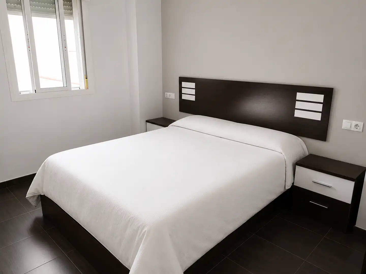 Habitación de Casa adosada en venta en Lora del Río con Aire acondicionado, Terraza y Trastero
