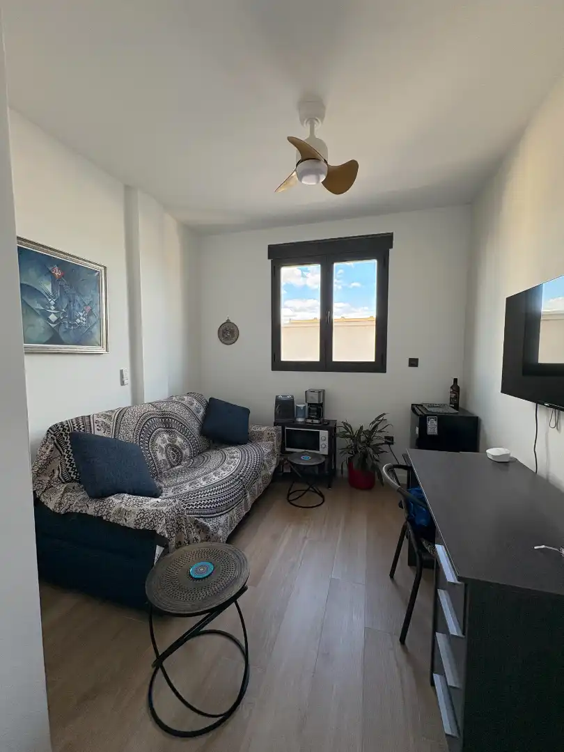 Sala d'estar de Casa adosada en venda en Alcantarilla amb Aire condicionat, Terrassa i Traster