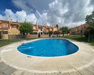 Piscina de Casa adosada en venda en El Portil amb Terrassa i Piscina