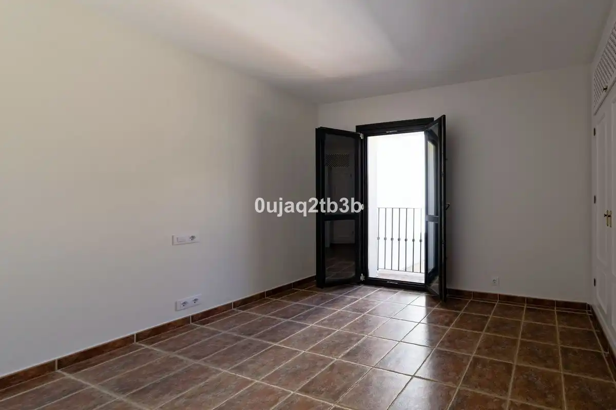 Habitación de Casa adosada de alquiler en Estepona con Aire acondicionado, Jardín privado y Terraza