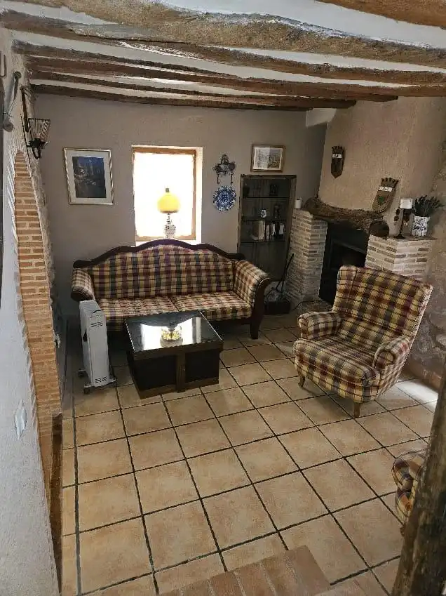 Sala d'estar de Casa adosada en venda en Benilloba
