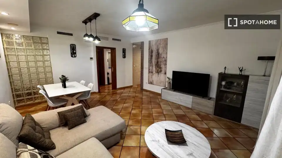 Sala de estar de Apartamento para compartir en Dénia con Aire acondicionado, Calefacción y Terraza