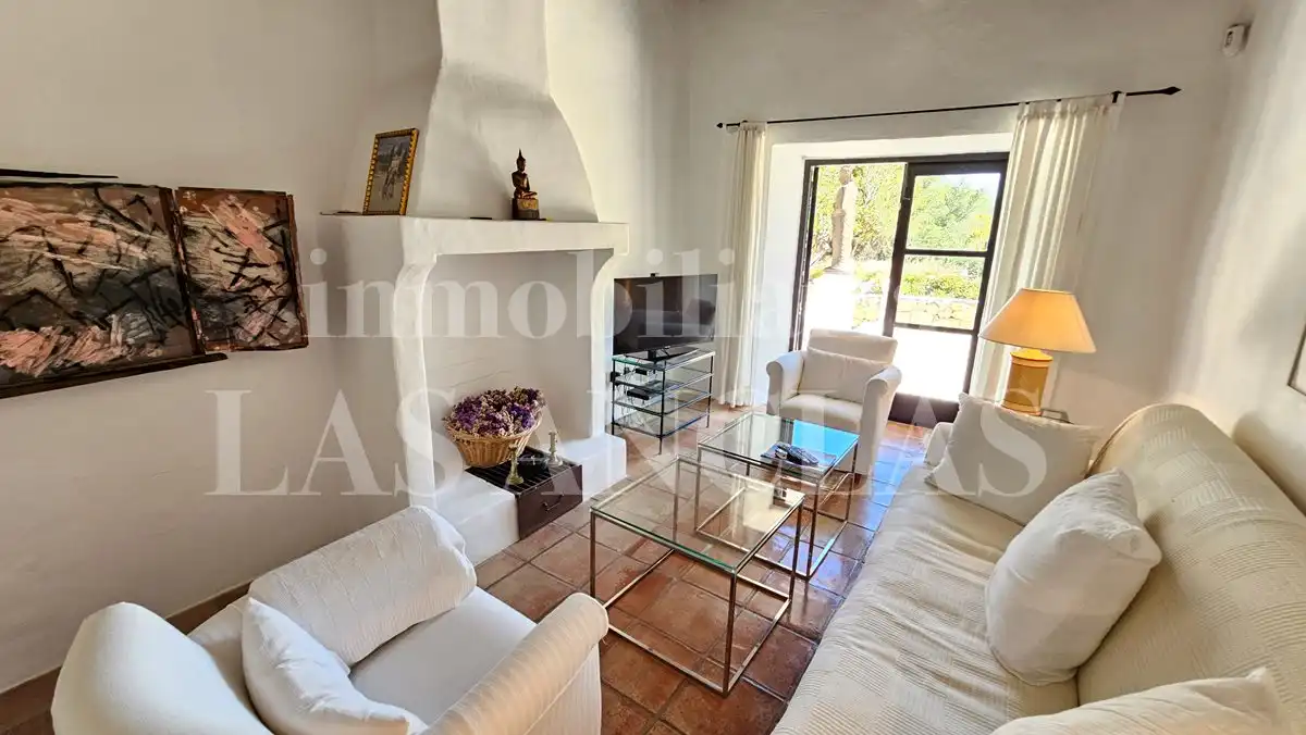 Wohnzimmer von Country house zum Verkauf in Santa Eulària des Riu mit Klimaanlage, Heizung und Terrasse