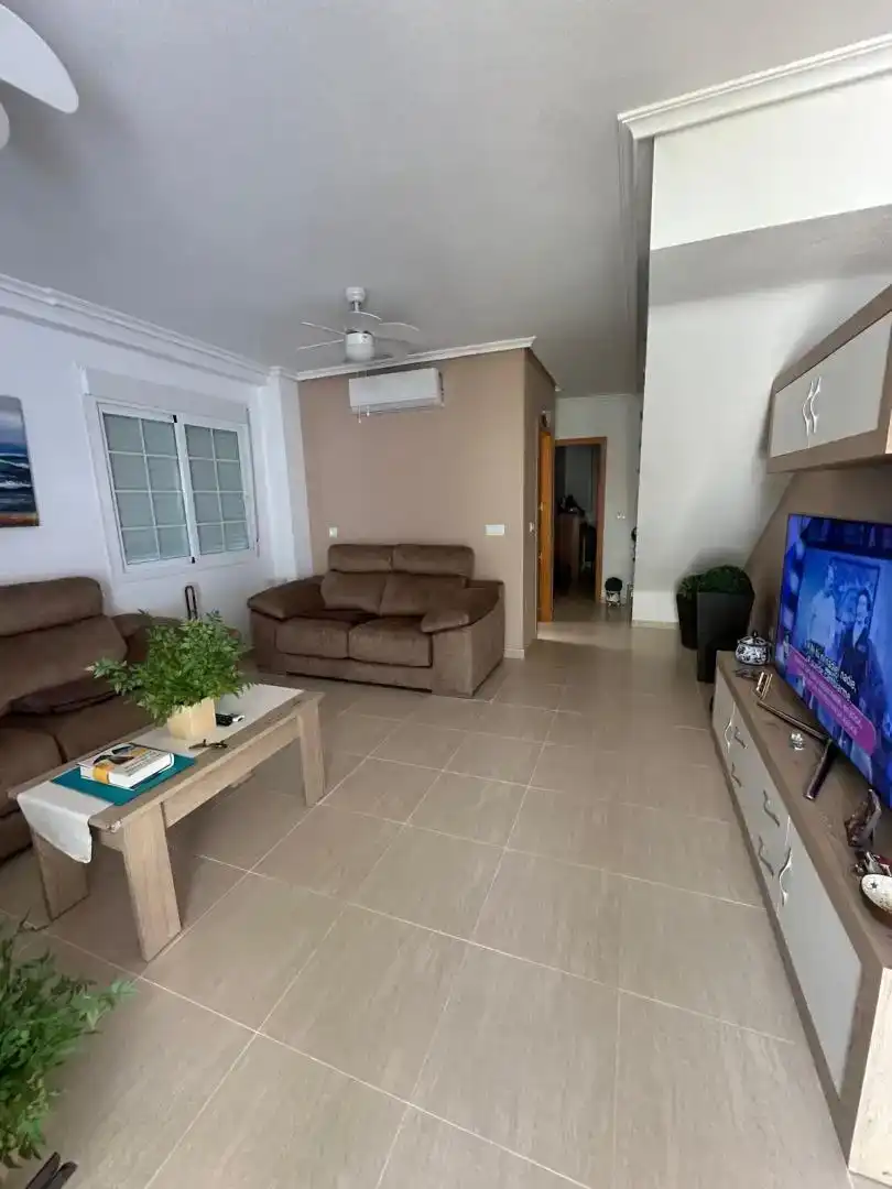 Sala d'estar de Casa adosada en venda en Pulpí amb Aire condicionat i Balcó
