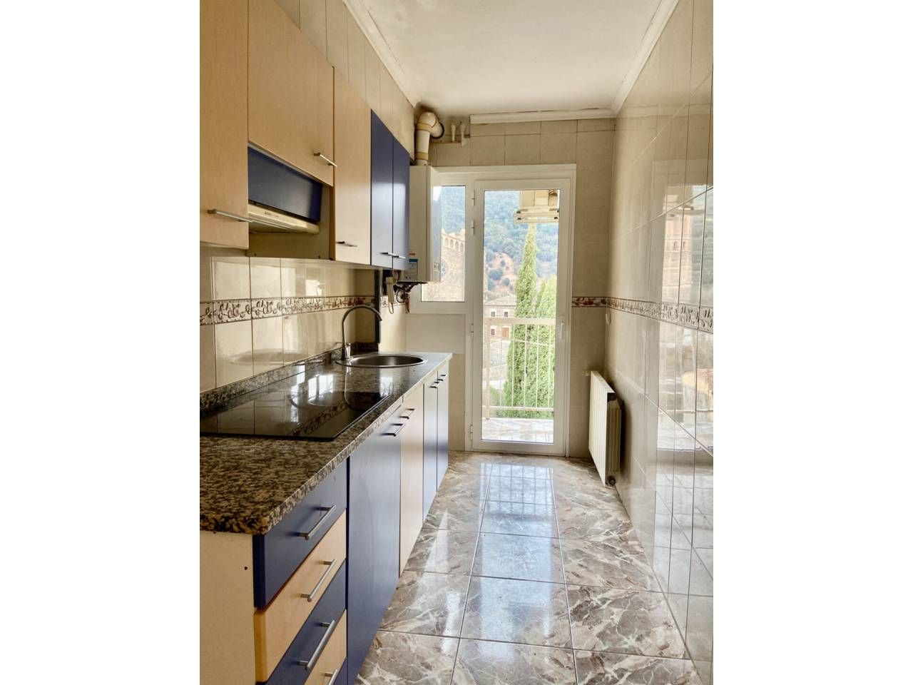 Kitchen of Flat for sale in Sant Joan Les Fonts  with Air Conditioner, Heating and Balcony
