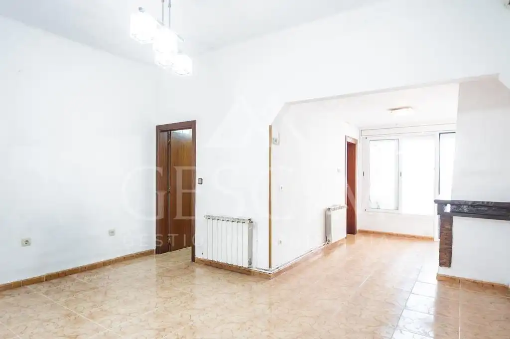 Sala d'estar de Casa adosada en venda en Sabadell amb Calefacció i Terrassa