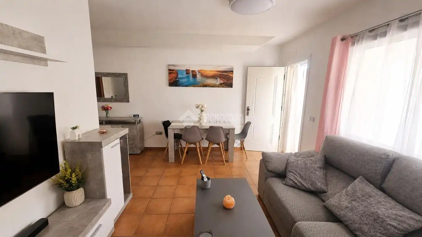Sala de estar de Casa adosada en venta en Almogía con Aire acondicionado y Terraza