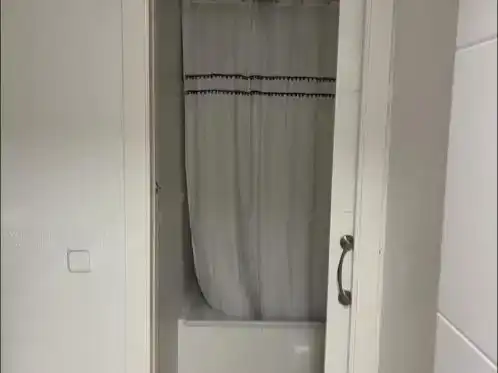 Bany de Apartament de lloguer en Oliva amb Aire condicionat, Piscina i Moblat