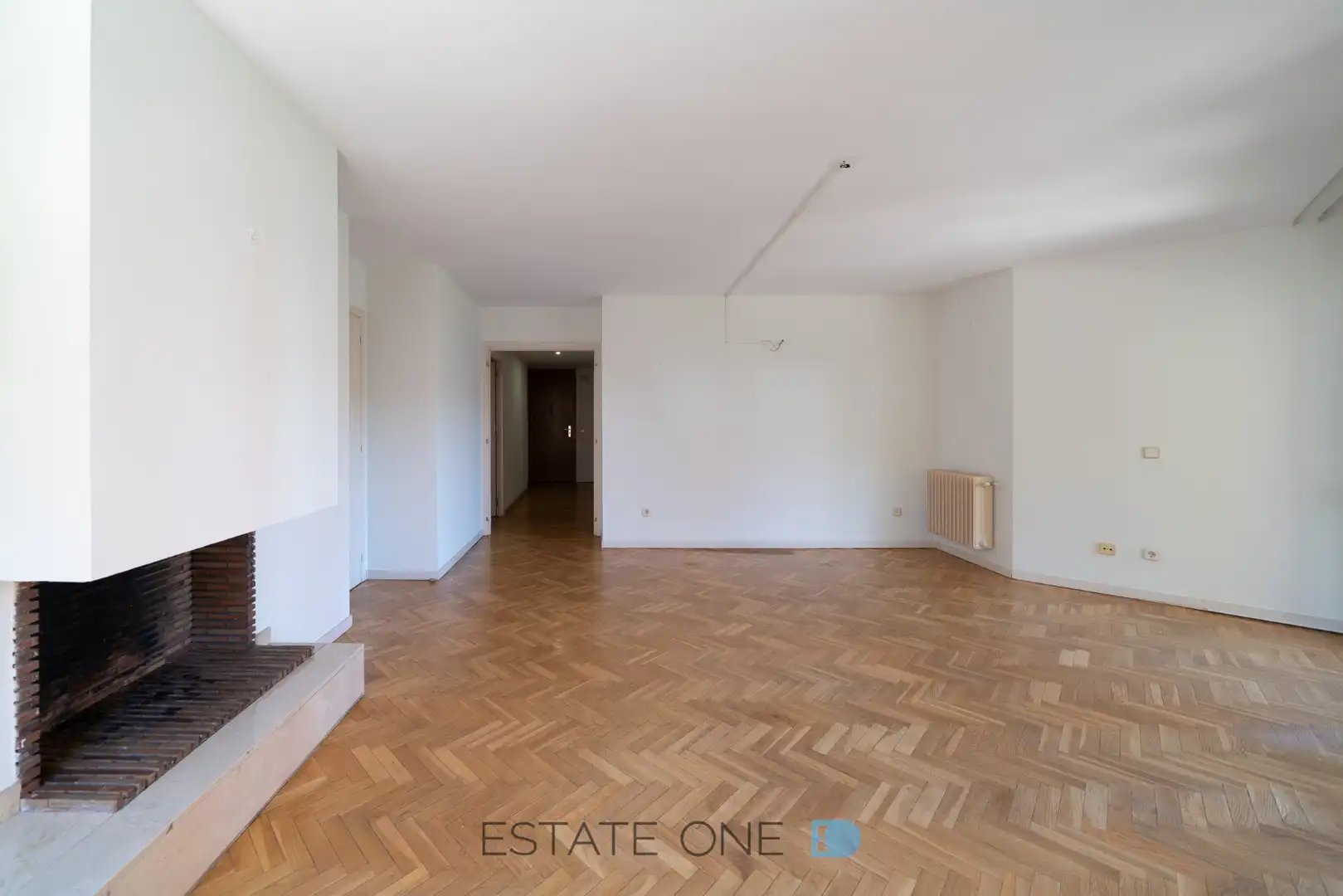 Sala de estar de Piso en venta en Pozuelo de Alarcón con Calefacción, Jardín privado y Parquet