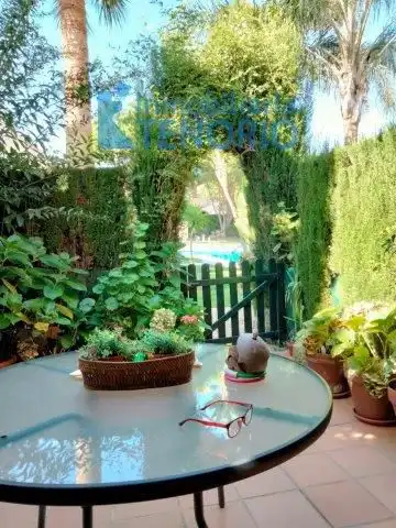 Jardín de Casa adosada en venta en Islantilla con Piscina comunitaria