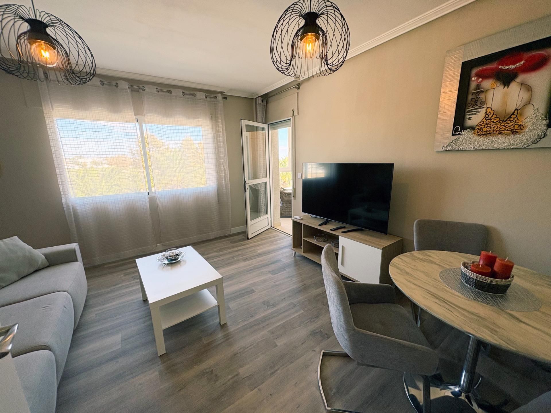 Sala d'estar de Casa adosada en venda en Pilar de la Horadada amb Aire condicionat, Calefacció i Jardí privat