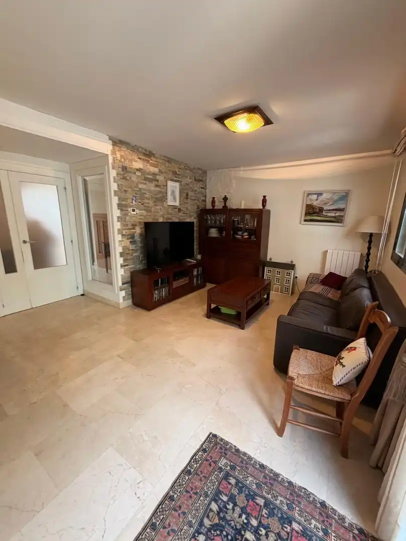 Sala de estar de Casa adosada en venta en Valdemoro con Aire acondicionado, Calefacción y Jardín privado