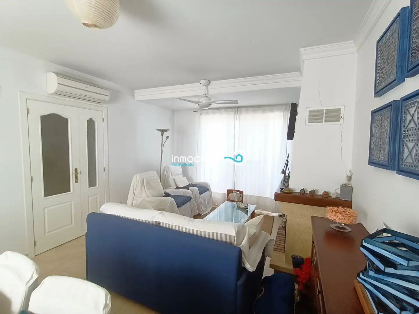 Sala de estar de Casa adosada en venta en Oliva con Aire acondicionado, Terraza y Piscina